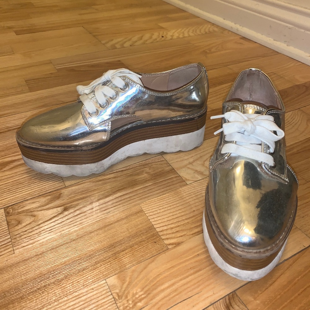 Metallic platform heel shoes with cut out detail